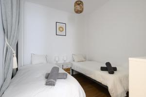 Katil atau katil-katil dalam bilik di HJS Plaza Suites Apartments II