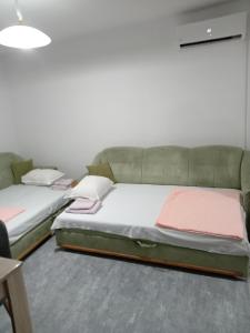 Katil atau katil-katil dalam bilik di Apartman Mira&Ahmet +15 gambar