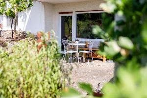 Κήπος έξω από το Ferienwohnung mit Kamin am Waldrand