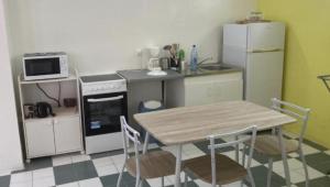 Eldhús eða eldhúskrókur á APPARTEMENT COQUELICOT 2 à 5 min du CENTRE VILLE FDF