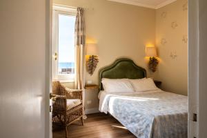 Voodi või voodid majutusasutuse Gian Paul Hotel toas