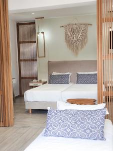 Кровать или кровати в номере Hotel Benois