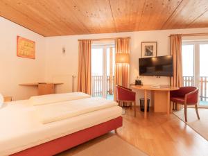 Giường trong phòng chung tại Macher's Landhotel +47 ảnh