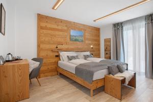 Postel nebo postele na pokoji v ubytování La Douce Pomme