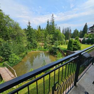 a view of a river from a balcony at Apartman Tatranská Štrba in Štrba