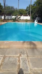 Bazén v ubytování Karibu homestay-nyali nebo v jeho okolí