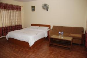 Postel nebo postele na pokoji v ubytování Kathmandu Madhuban Guest House