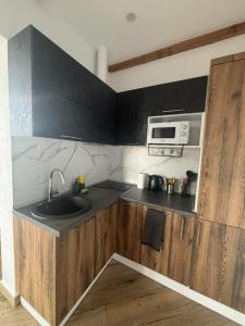 Kuchyň nebo kuchyňský kout v ubytování Agora Sundeck Tsikhisdziri + 37 fotografií