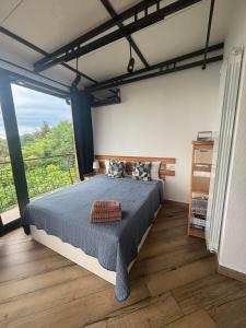 Postel nebo postele na pokoji v ubytování Agora Sundeck Tsikhisdziri
