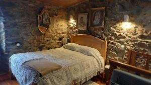 Ένα ή περισσότερα κρεβάτια σε δωμάτιο στο O Palheirinho - Turismo Rural - Bragança