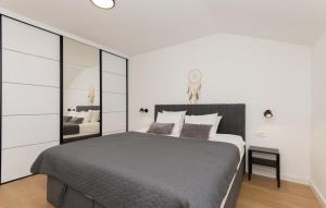Ένα ή περισσότερα κρεβάτια σε δωμάτιο στο Home Sweet Home - Makarska by Villas Guide +30 φωτογραφίες