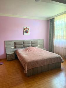Postel nebo postele na pokoji v ubytování Tsikhisdziri Hotel