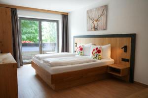Ένα ή περισσότερα κρεβάτια σε δωμάτιο στο Hotel Bad Neunbrunnen am Waldsee - non Halal