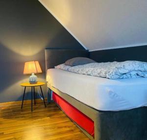Postel nebo postele na pokoji v ubytování Lily-Rose Cottage