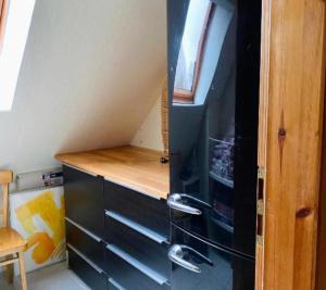 TV a/nebo společenská místnost v ubytování Lily-Rose Cottage