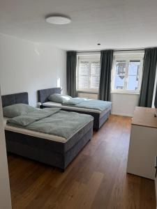 Postel nebo postele na pokoji v ubytování TS-Ludwig