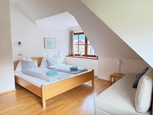 Posteľ alebo postele v izbe v ubytovaní Villa Schnuck - das rote Ferienhaus