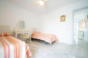 Posteľ alebo postele v izbe v ubytovaní LB - Lomos Blancos Mojacar