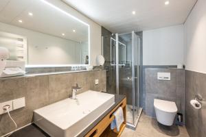 Ένα μπάνιο στο Hotel Garni Schellenberg