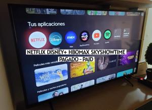 a television screen with a bunch of apps on it at Apartalux Centralmar Centro in Benidorm