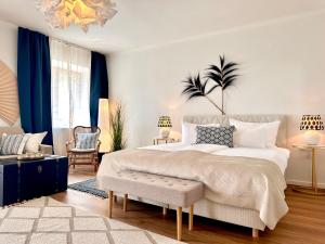 Postel nebo postele na pokoji v ubytování Strandhotel Kärntnerhof
