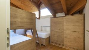 Postel nebo postele na pokoji v ubytování Chalet la Segheria