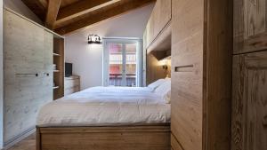 Postel nebo postele na pokoji v ubytování Chalet la Segheria