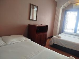 Postel nebo postele na pokoji v ubytování Hotel Milan Cartagena