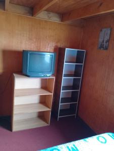 Телевизор и/или развлекательный центр в Departamento Interior Fundo el Carmen