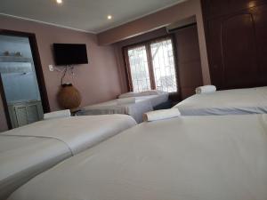 Postel nebo postele na pokoji v ubytování Hotel Milan Cartagena