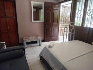 Postel nebo postele na pokoji v ubytování Hotel Milan Cartagena