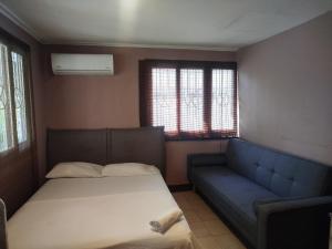 Postel nebo postele na pokoji v ubytování Hotel Milan Cartagena