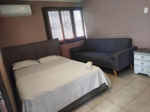 Postel nebo postele na pokoji v ubytování Hotel Milan Cartagena