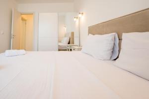 Postel nebo postele na pokoji v ubytování Symphony Tivat Apartment