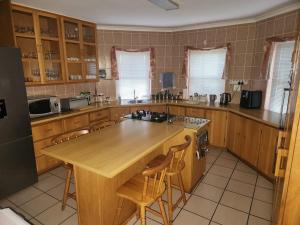 Kuchyň nebo kuchyňský kout v ubytování Fairway Corner + 9 fotografií