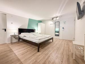 Ένα ή περισσότερα κρεβάτια σε δωμάτιο στο Chesscom Guesthouse