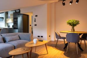 Ruang duduk di Apartamentos sarmiento - ático