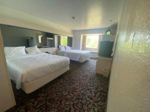 Postel nebo postele na pokoji v ubytování Motel 6 McAlester OK - South