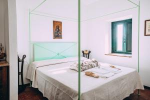 Postel nebo postele na pokoji v ubytování Convento Dei Riformati