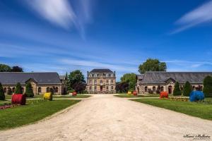 an estate with a large house with a driveway at House for 9 people in Saint-Clair-sur-lʼElle