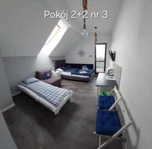 Postel nebo postele na pokoji v ubytování Kaper Rewa