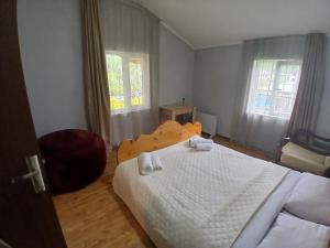 Postel nebo postele na pokoji v ubytování Mishgu Qor