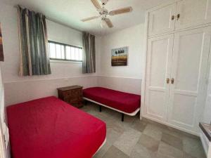 Postel nebo postele na pokoji v ubytování Bonito apartamento cerca la playa + 24 fotografií