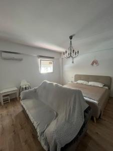 Ένα ή περισσότερα κρεβάτια σε δωμάτιο στο Apart Rossa 200 metros playa