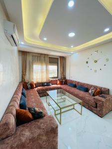 Гостиная зона в Appartement Bord de Mer - White Beach Tamraght