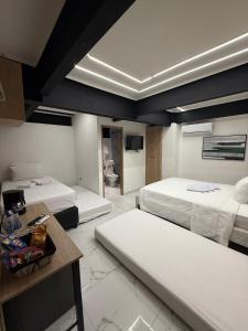 Postel nebo postele na pokoji v ubytování Foret Lofts