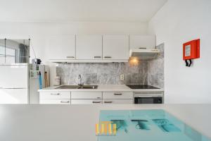 Η κουζίνα ή μικρή κουζίνα στο Summer studio with big sunny terrace