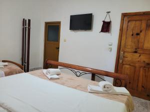 Postel nebo postele na pokoji v ubytování Guesthouse Reçka
