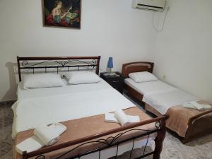 Postel nebo postele na pokoji v ubytování Guesthouse Reçka