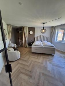 Postel nebo postele na pokoji v ubytování Stylish Studio in Copenhagen